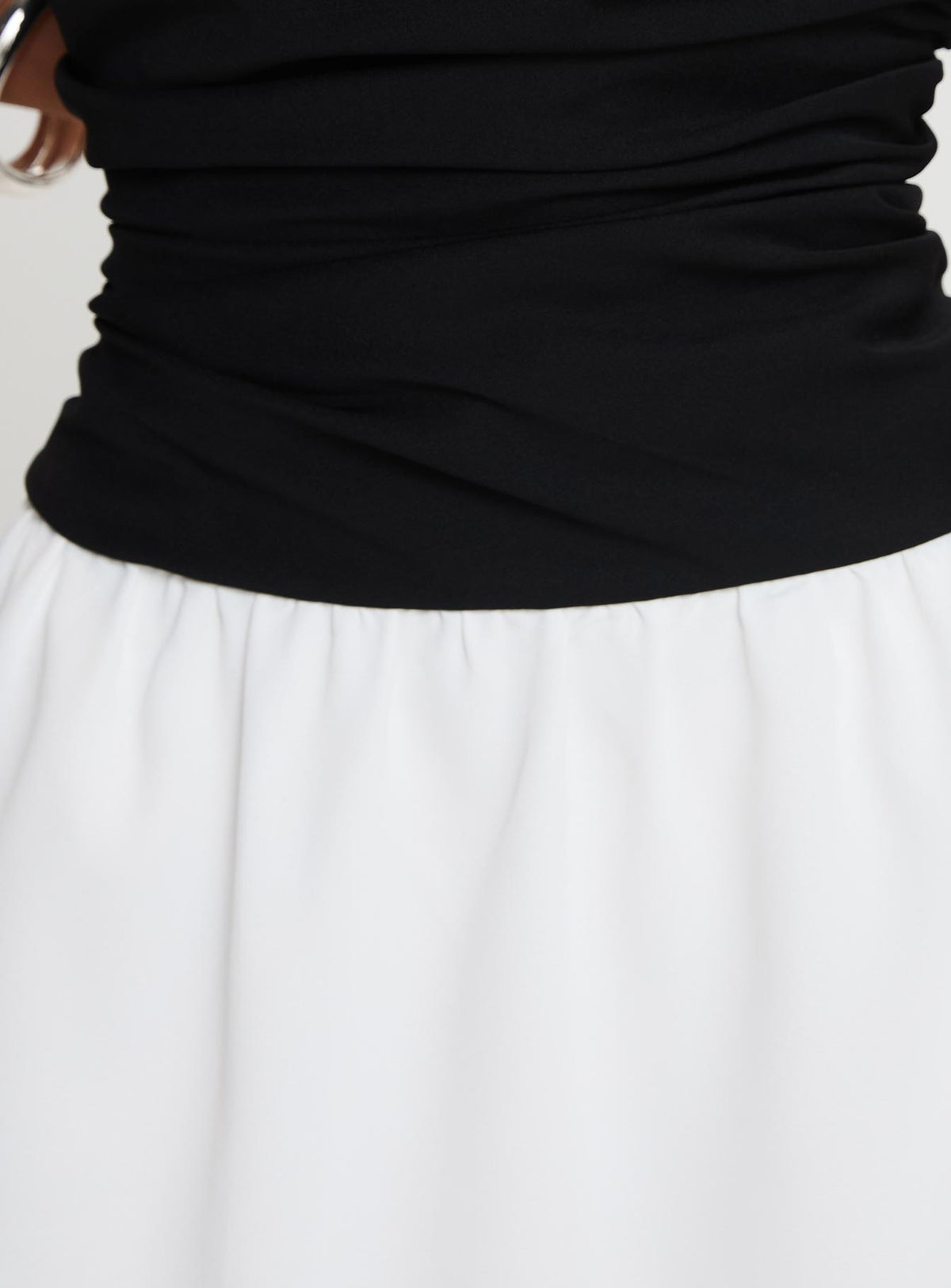 back view of model wearing Princess Polly First Impressions Strapless Mini Dress Black / White Straight Neck 