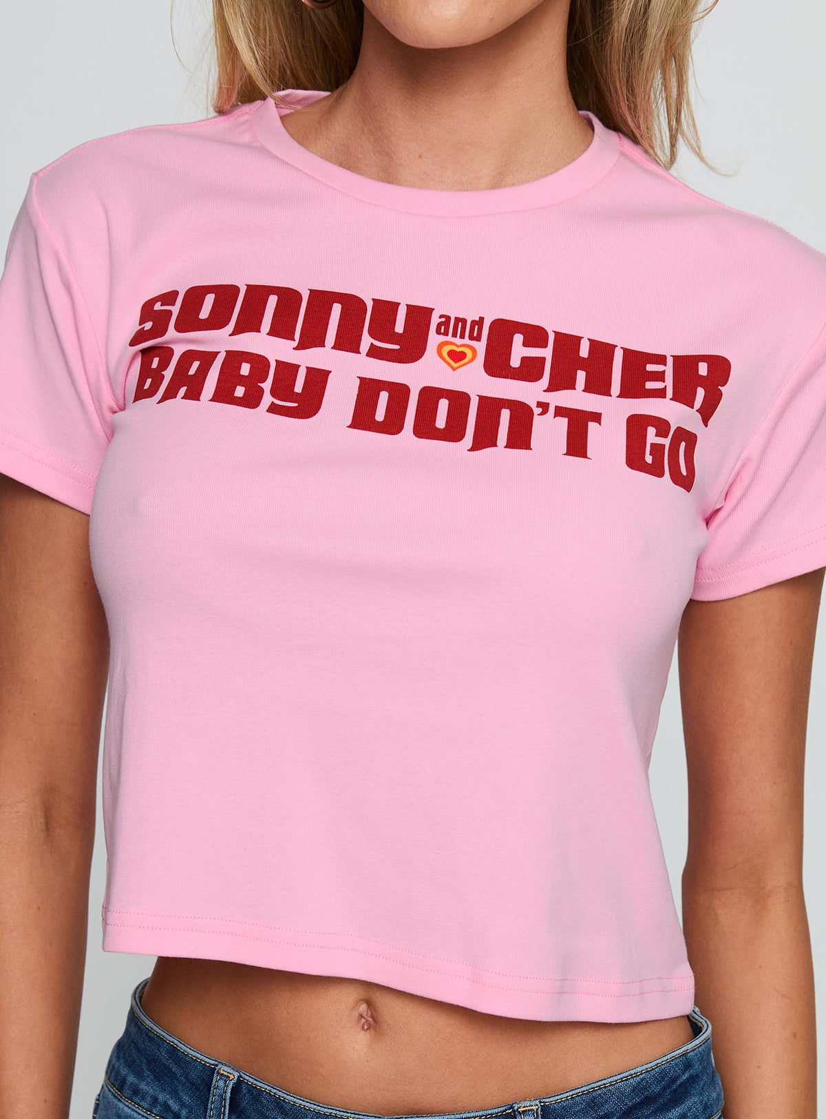 front view of model wearing Princess Polly Sonny And Cher Vintage Graphic Top Pink Short Sleeves Crew Neck 