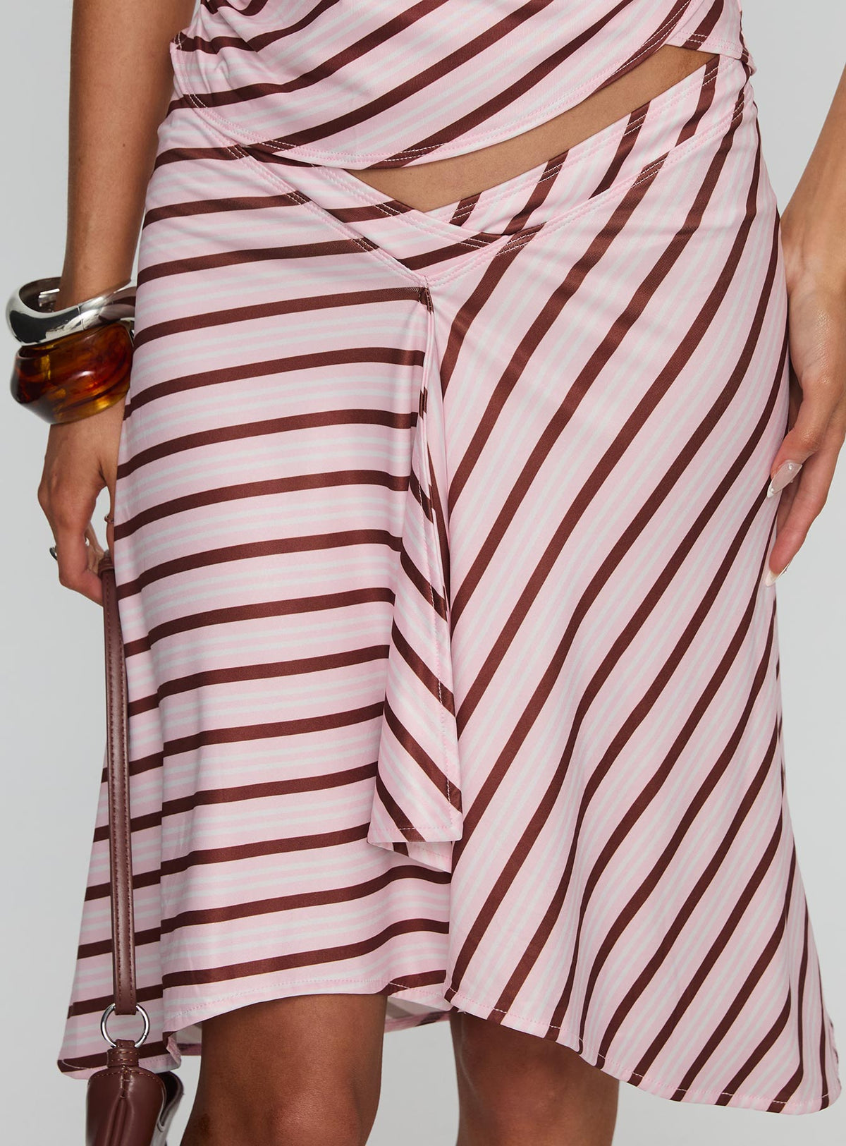   side view of model wearing Princess Polly Esmeray Midi Skirt Pink Stripe Skirts 