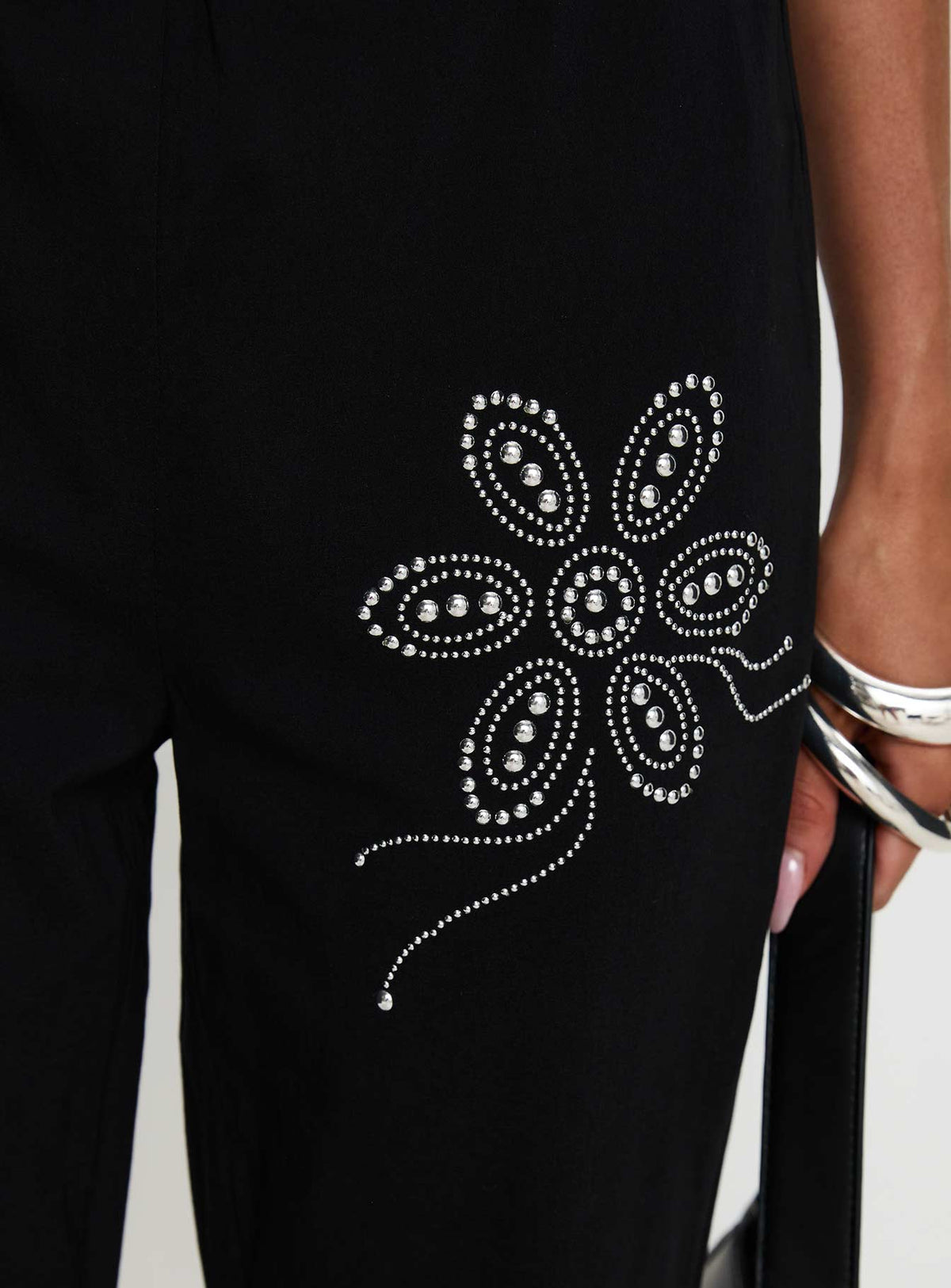 back view of model wearing Princess Polly Quotation Diamante Flare Pants Black Low Rise Pants Pants 