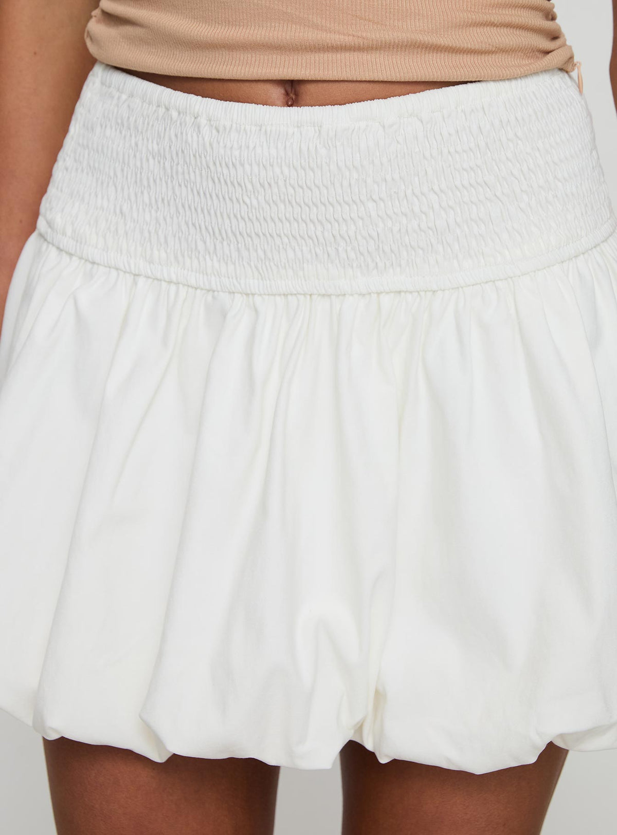 back view of model wearing Princess Polly Neddy Bubble Hem Mini Skirt White Mini Skirts Skirts 