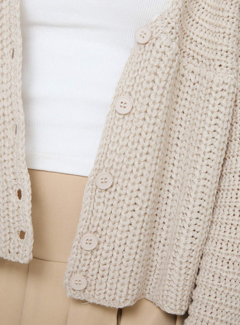 Crafted Artha Cardigan Beige womens-jumpers in short length side view of model wearing Princess Polly