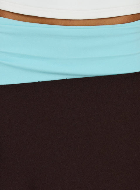 Featuring the Suave Asymmetrical Contrast Midi Skirt Brown / Aqua womens-skirts in midi length view of model wearing Princess Polly