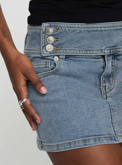 back view of model wearing Princess Polly Brinkman Mini Skirt Light Wash Denim Mini Skirts Skirts 