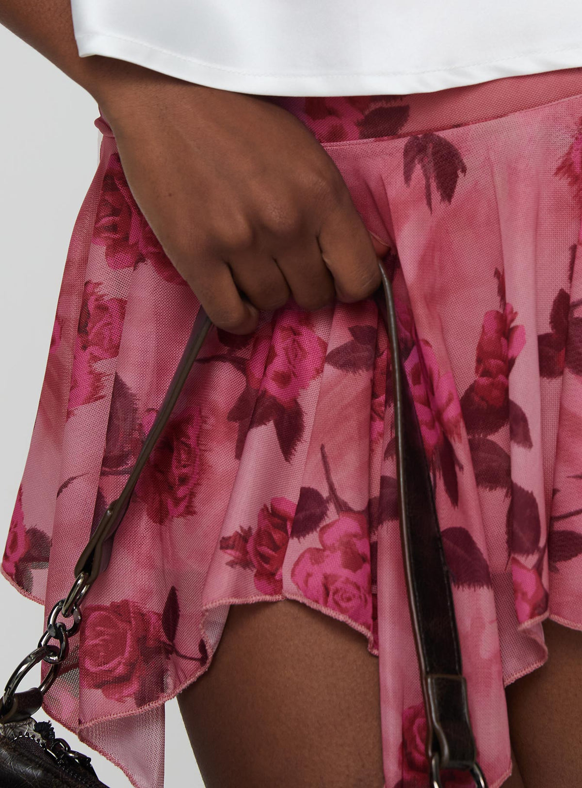 back view of model wearing Princess Polly Perezie Mini Skirt Pink Mini Skirts Skirts 