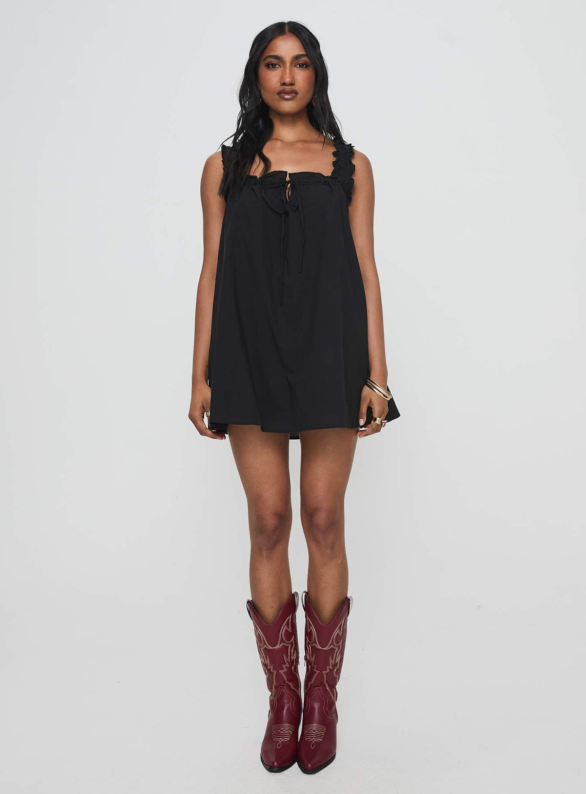 front view of model wearing Princess Polly Swing Mini Dress Black Square Neck 