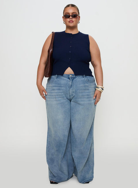 side view of model wearing Princess Polly Suzu Sleeveless Top Navy Curve Sleeveless Crew Neck 