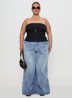 side view of model wearing Princess Polly Flounce Strapless Top Black Curve Sleeveless straight 