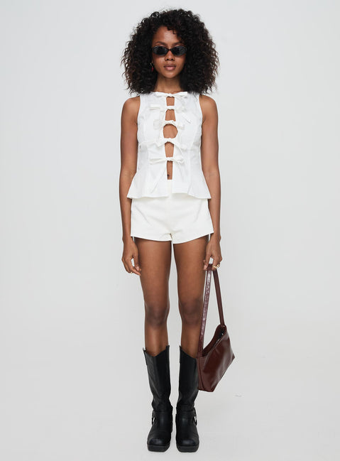 front view of model wearing Princess Polly Luminary Tie Up Top White Sleeveless Crew Neck 
