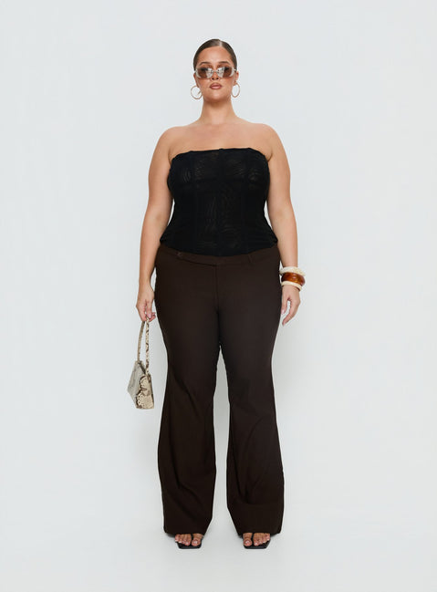 back view of model wearing Princess Polly Kinkirk Flared Pants Chocolate Curve Mid Rise Pants Pants 