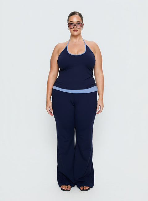 front view of model wearing Princess Polly Kobee Jersey Flare Pants Navy / Light Blue Curve High Rise Pants Pants 