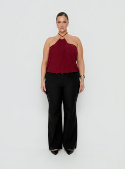 Showcasing the Yevina Eyelet Flare Pant Black Curve womens-regular-pants with mid-rise front view of model wearing Princess Polly