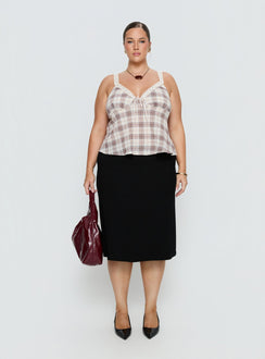   side view of model wearing Princess Polly Baseline Rib Midi Skirt Black Curve Midi Skirts Skirts 