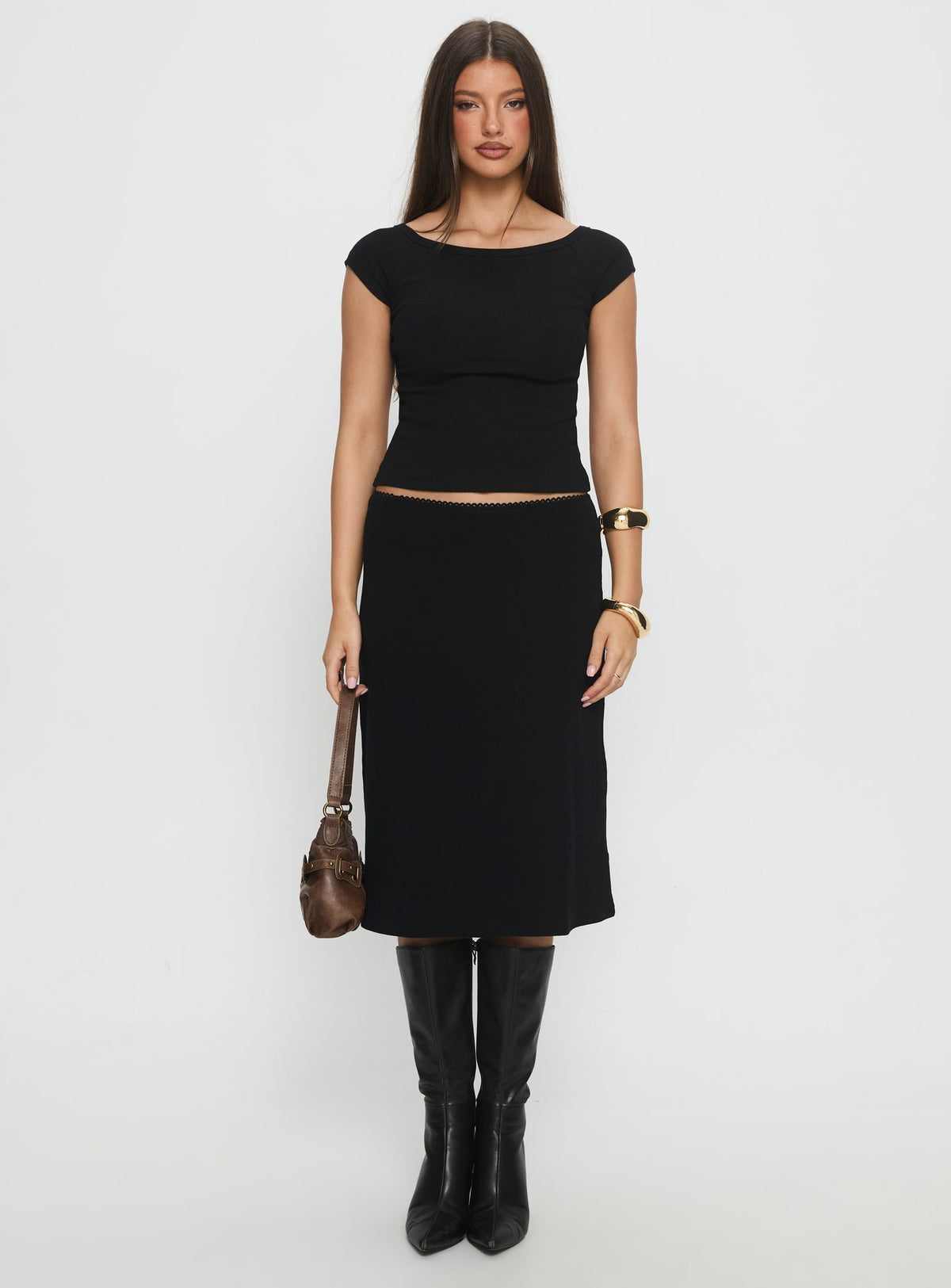   front view of model wearing Princess Polly Baseline Rib Midi Skirt Black Midi Skirts Skirts 