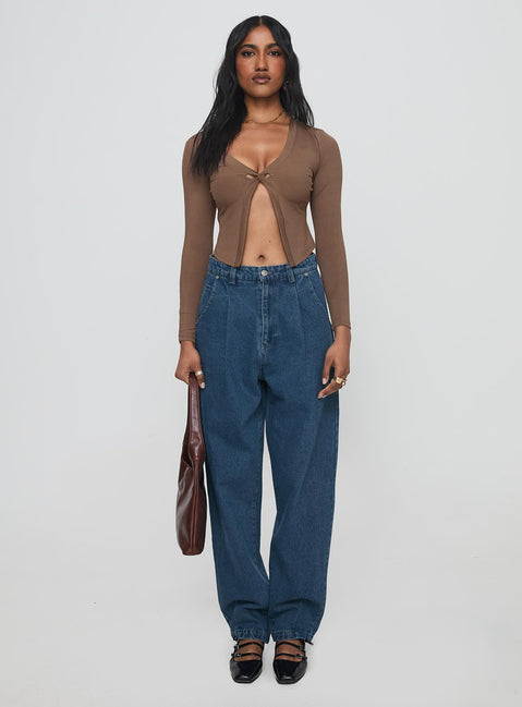 front view of model wearing Princess Polly Forestier Mid Rise Barrel Leg Pin Tuck Jeans Mid Blue High Rise Jeans Jeans 