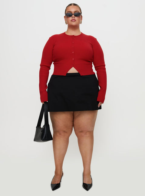 front view of model wearing Princess Polly Sora Skort Black Curve High Waisted Shorts 