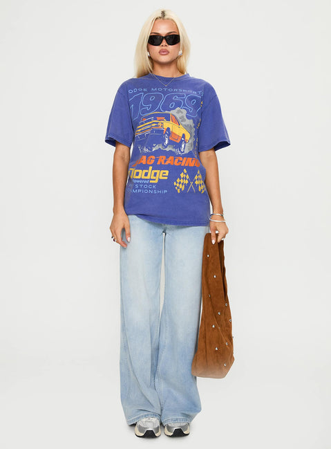 side view of model wearing Princess Polly Dodge 1969 Oversized Graphic Top Blue Half Sleeves Crew Neck 