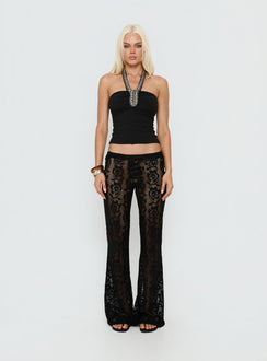 Featuring Rosadonna Lace Flare Pants Black in womens regular pants with mid-rise front view of model wearing Princess Polly