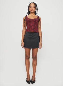 front view of model wearing Princess Polly Rehna Top Red Floral Sleeveless V-Neck 