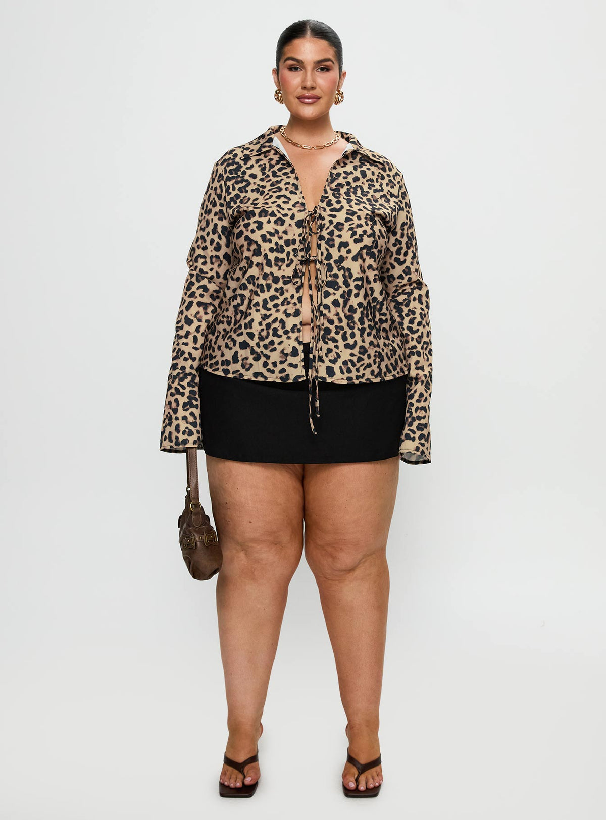 front view of model wearing Princess Polly Toriah Long Sleeve Tie Up Top Leopard Curve Full Sleeves V-Neck 