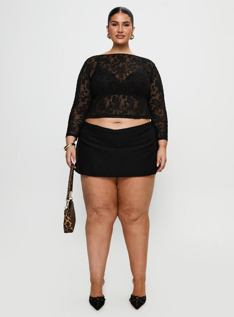 side view of model wearing Princess Polly Martine Sheer Top Black Curve Full Sleeves Boat Neck 
