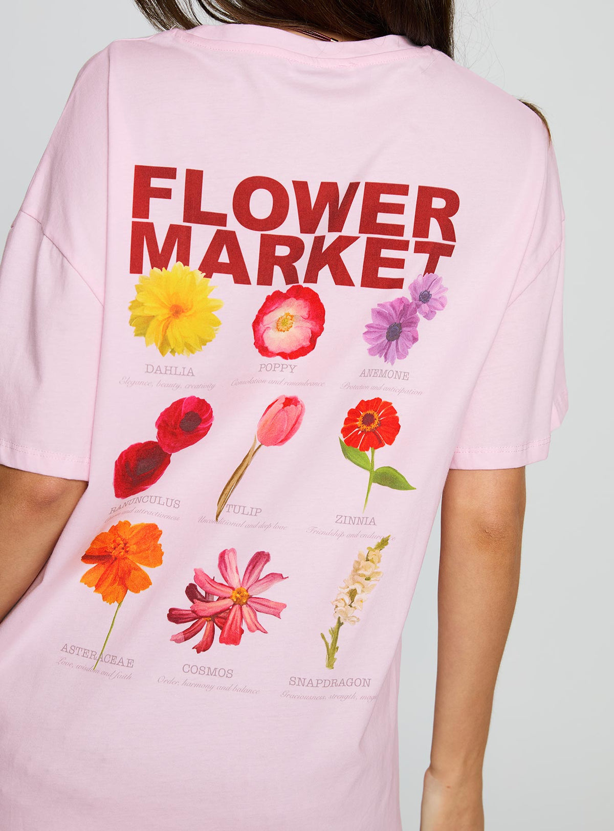 side view of model wearing Princess Polly Flower Chart Oversized Tee Pink Half Sleeves Crew Neck 