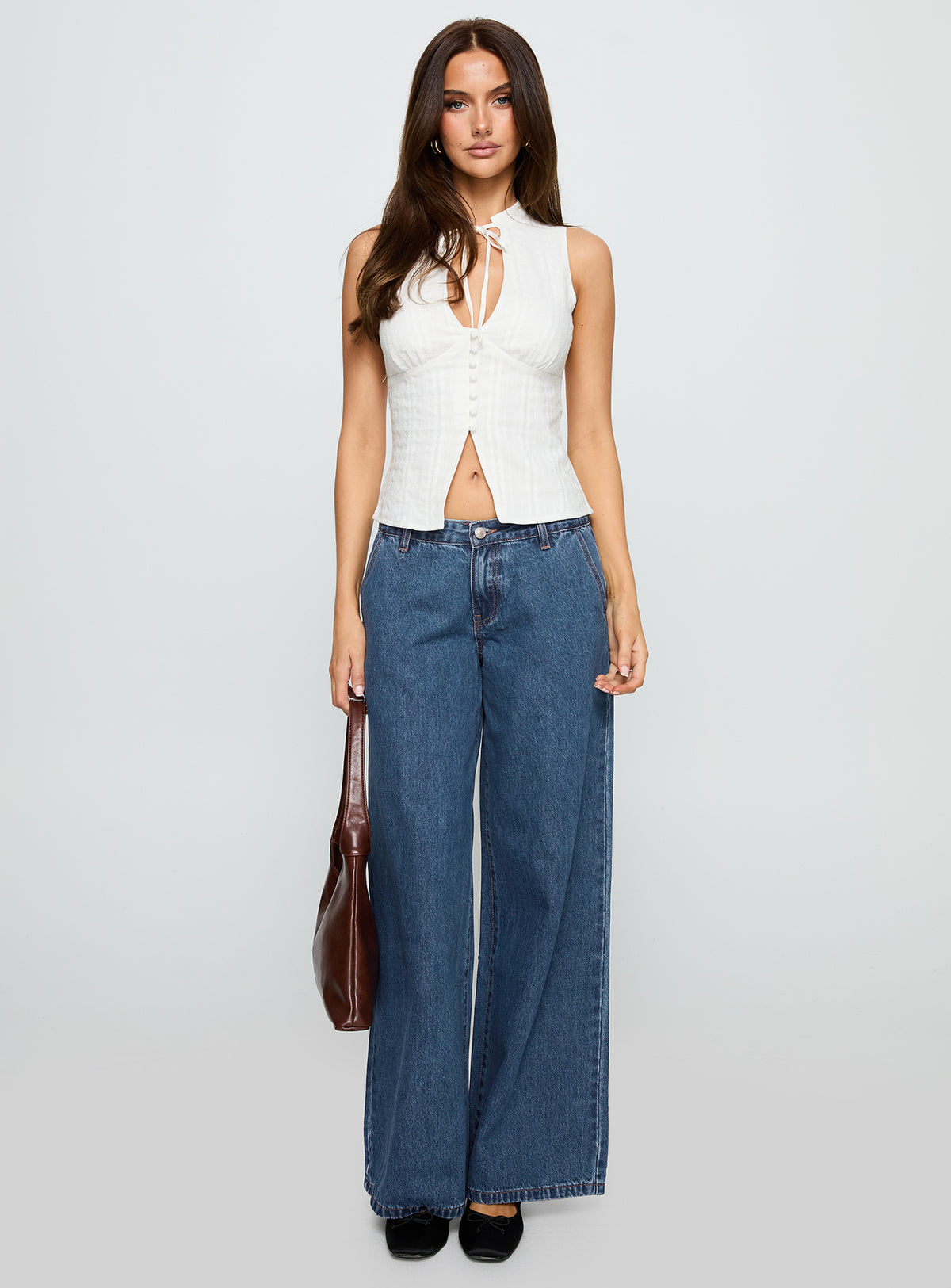 front view of model wearing Princess Polly Tempting Tie Detail Top White Sleeveless High Neck 