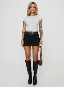 back view of model wearing Princess Polly Aster Mini Skirt Black Mini Skirts Skirts 