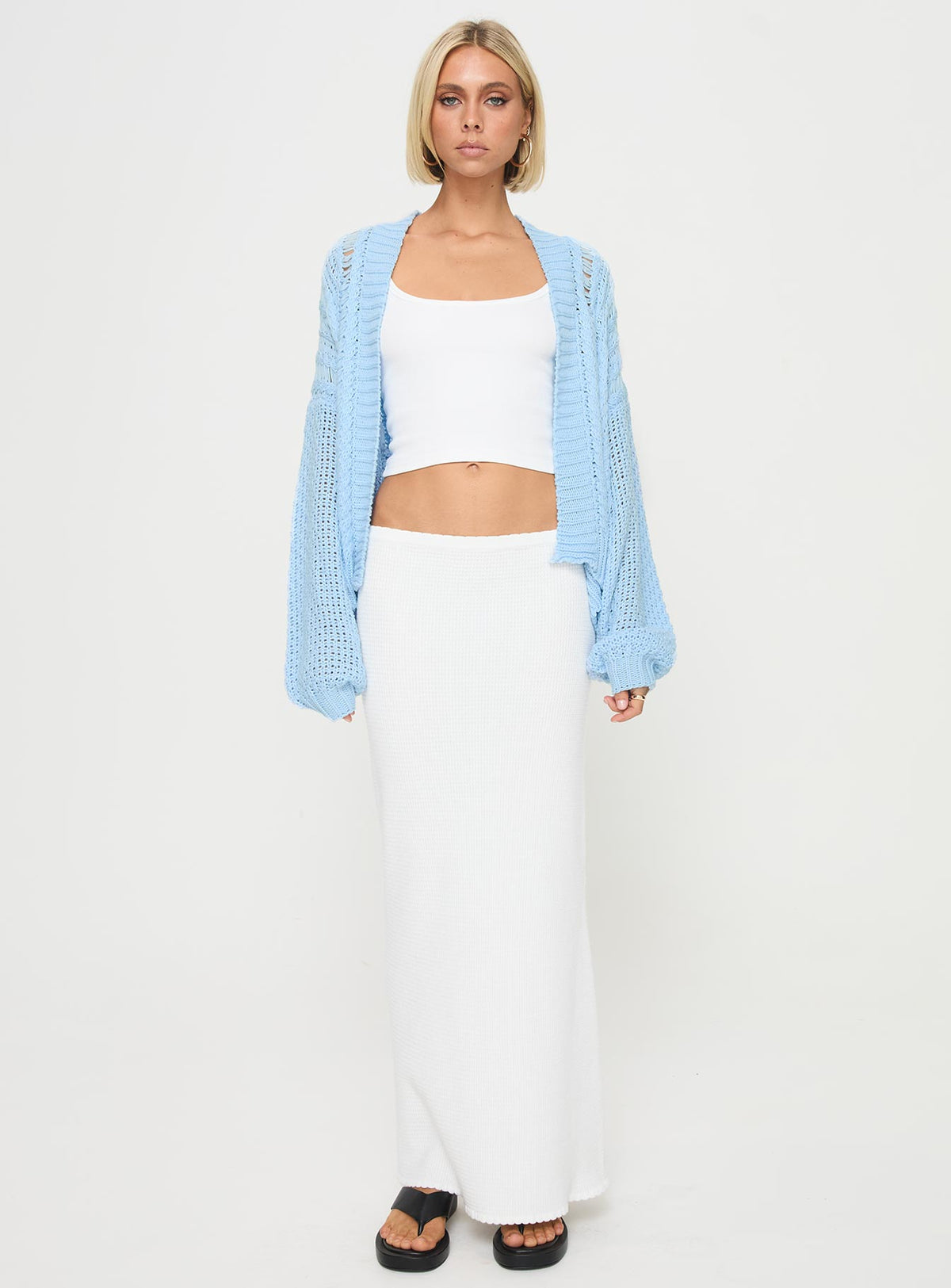 front view of model wearing Princess Polly Abner Cable Cardigan Blue regular Jumpers 