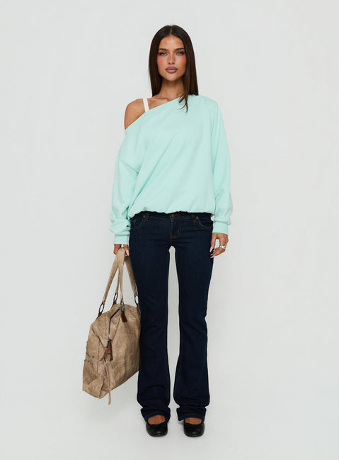Showcasing the Wellness Off The Shoulder Sweatshirt in pale turquoise womens-jumpers with oversized fit and boat neckline, short length front view of model wearing