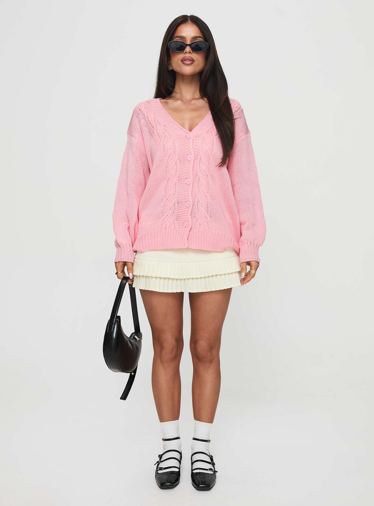 back view of model wearing Princess Polly Sezza Cable Knit Cardigan Baby Pink Longline Jumpers Jumpers 