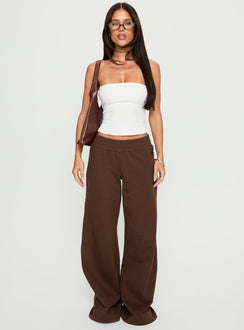 front view of model wearing Princess Polly Summits Flared Track Pants Chocolate High Rise Pants Pants 