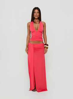 Showcasing the Keerah Ruched Maxi Skirt Guava in coral with womens-skirts category featuring maxi length front view of model wearing Princess Polly