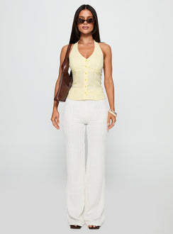 side view of model wearing Princess Polly Old Friend Halter Top Yellow Stripe Sleeveless V-Neck 