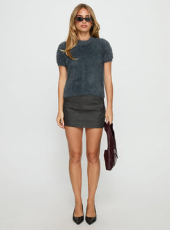   front view of model wearing Princess Polly Flashbacks Low Rise Mini Skirt Washed Black Mini Skirts Skirts 