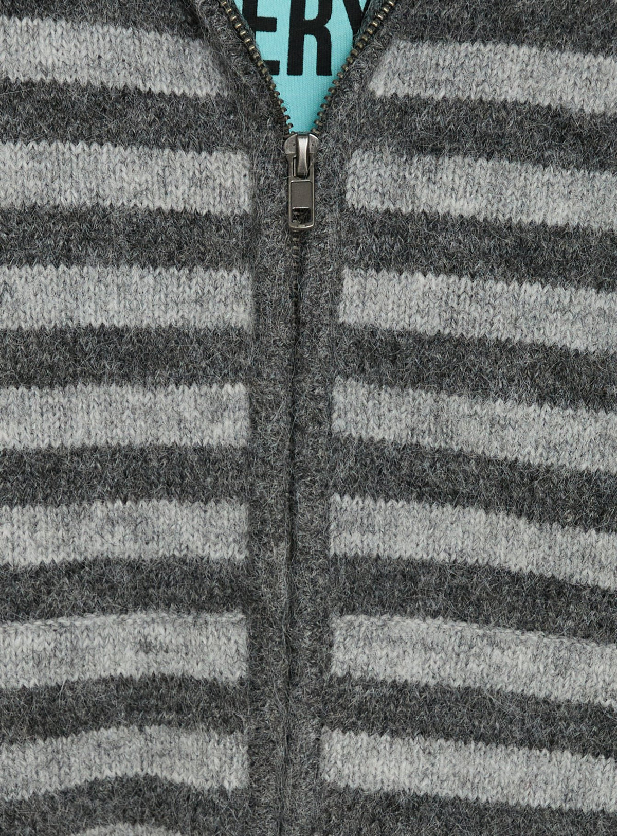 Close-up of the Aubry Oversized True Knit Hoodie in Grey Stripe, a short length womens jumper showcasing striped knit texture and zipper detail Princess Polly