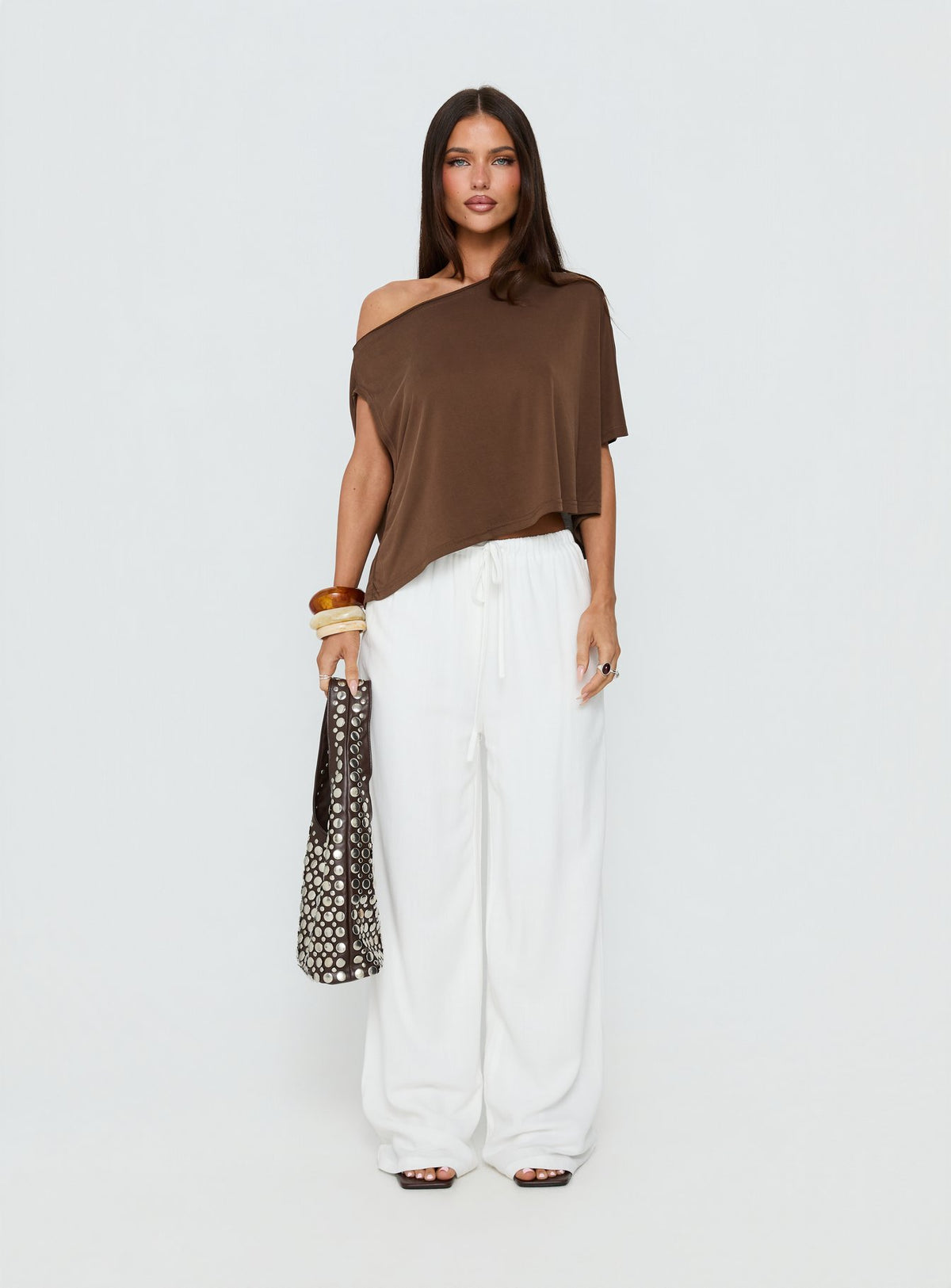 Featuring the Parklea Pants White Petite in womens-regular-pants with high-rise waist front view of model wearing Princess Polly
