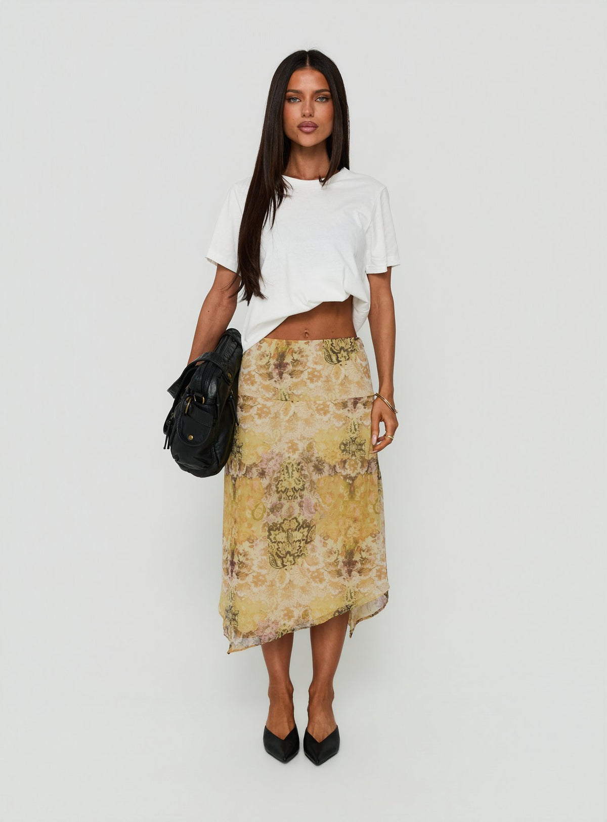Highlighting the Daphene Asymmetrical Midi Skirt Multi in womens-skirts with abstract print close-up Princess Polly