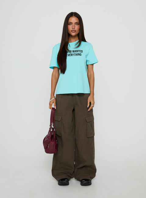 Showcasing the Scarletta Ultra Wide Elasticated Waist Cargo Pants Khaki in womens regular pants with high-rise front view of model wearing Princess Polly