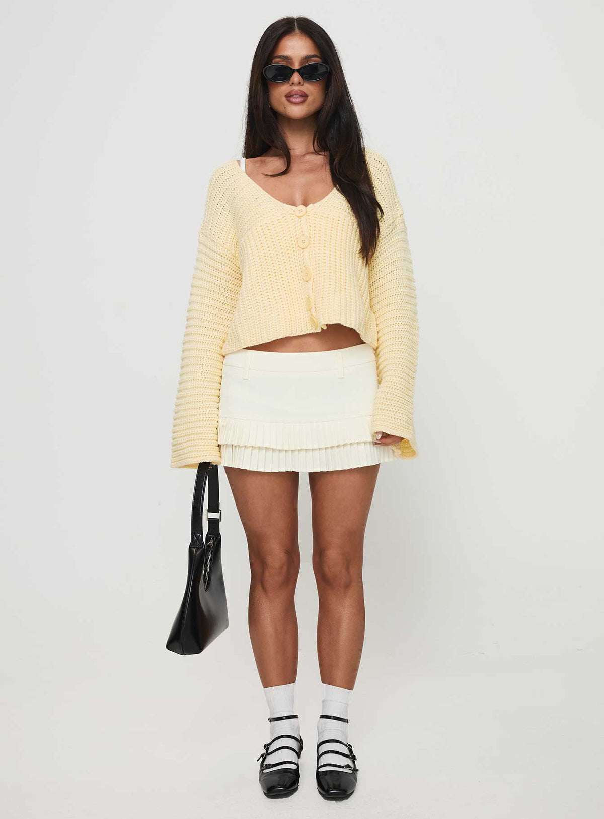 front view of model wearing Princess Polly Artha Cardigan Lemon Cropped Jumpers Jumpers 