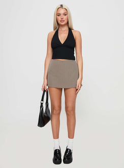 front view of model wearing Princess Polly Gigi Skort Beige Pinstripe Tall High Waisted Shorts 