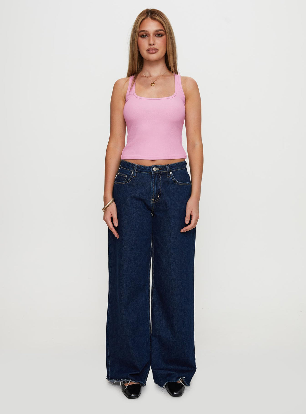 side view of model wearing Princess Polly Baseline Square Neck Rib Tank Top Pale Pink Sleeveless Scoop Neck 