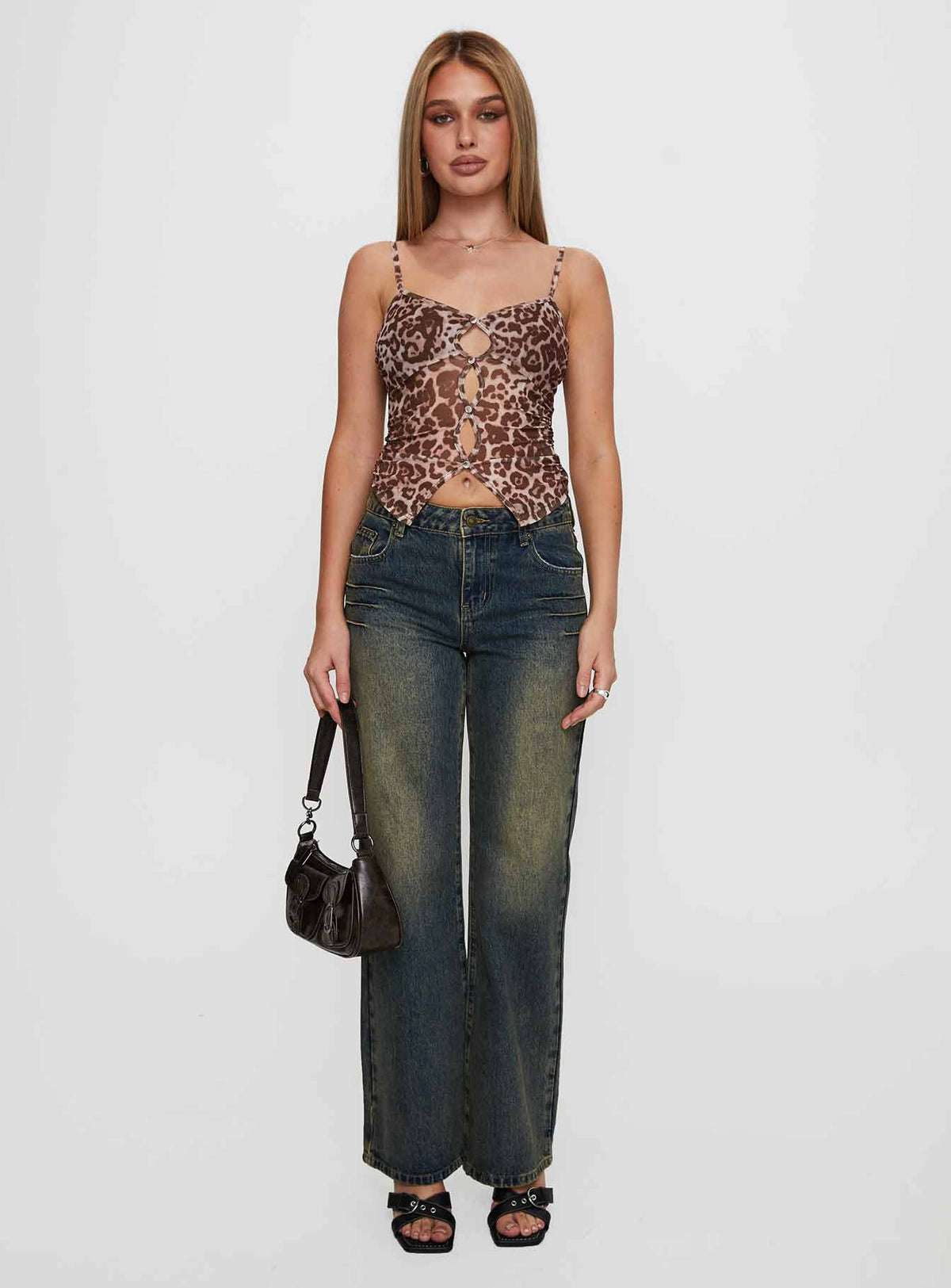 front view of model wearing Princess Polly Inverness Pinched Detail Mid Rise Wide Leg Jeans Tea Mid Rise Jeans Jeans 