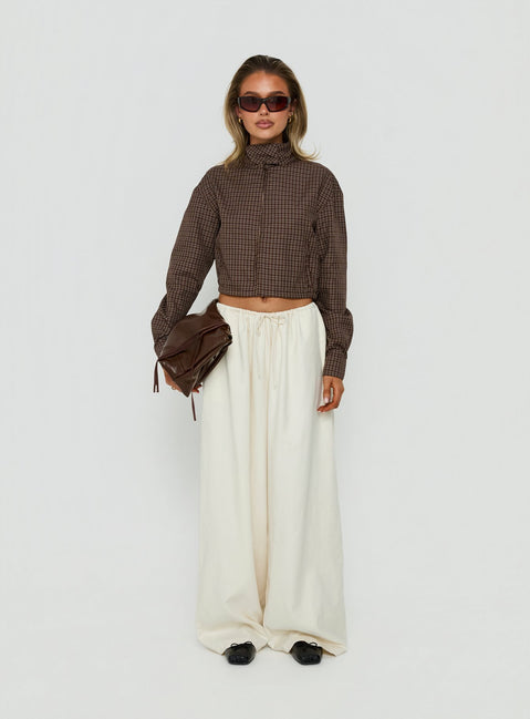 Introducing the Bungala Oversized Relaxed Pants in Ivory Petite womens-regular-pants featuring high-rise waist and wide-leg silhouette front view of model wearing Princess Polly