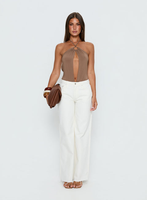 side view of model wearing Princess Polly Damiana Cut Out Bodysuit Brown Sleeveless Bodysuit 