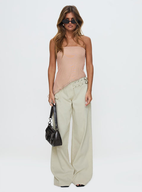 side view of model wearing Princess Polly Paxon Asymmetrical Top Beige Sleeveless straight 