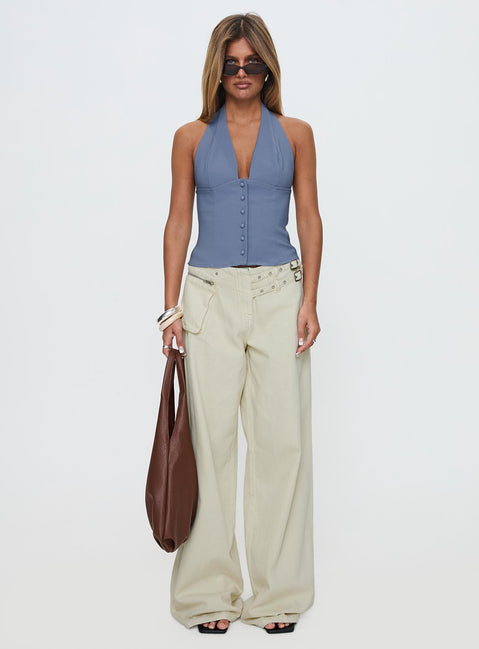 side view of model wearing Princess Polly Paltrow Mid Rise Wide Leg Cargo Jeans Cream Petite Low Rise Jeans 