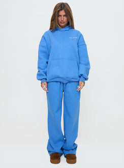 front view of model wearing Princess Polly Princess Polly Hooded Sweatshirt Bubble Text Blue / White Jumpers 