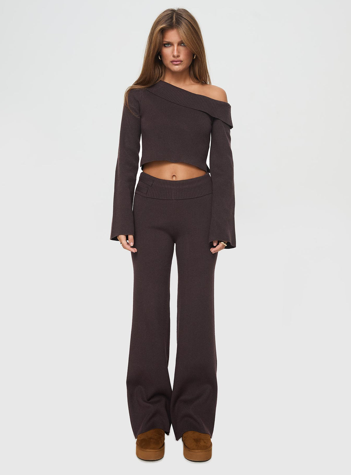 side view of model wearing Princess Polly Sina Off The Shoulder Top Chocolate Full Sleeves Asymmetric Neckline 