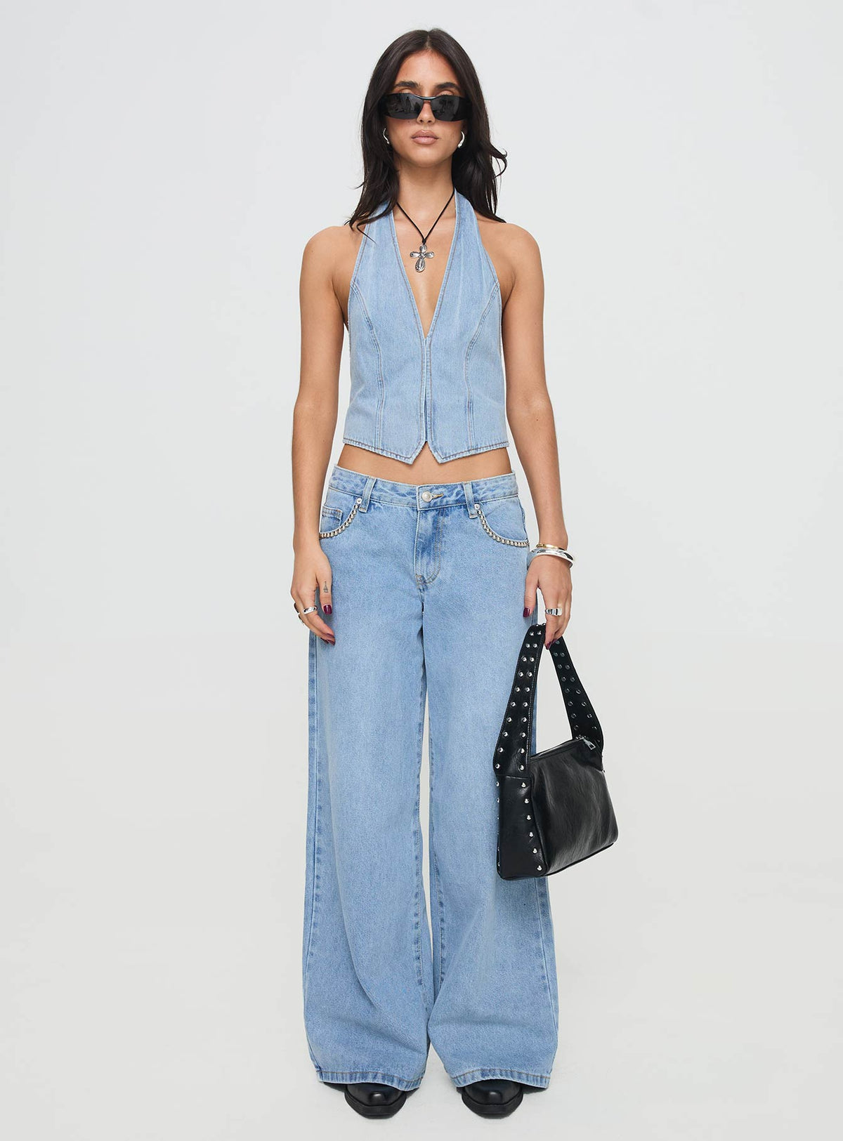 front view of model wearing Princess Polly Pearlisle Low Rise Baggy Jeans Light Wash Low Rise Jeans Jeans 
